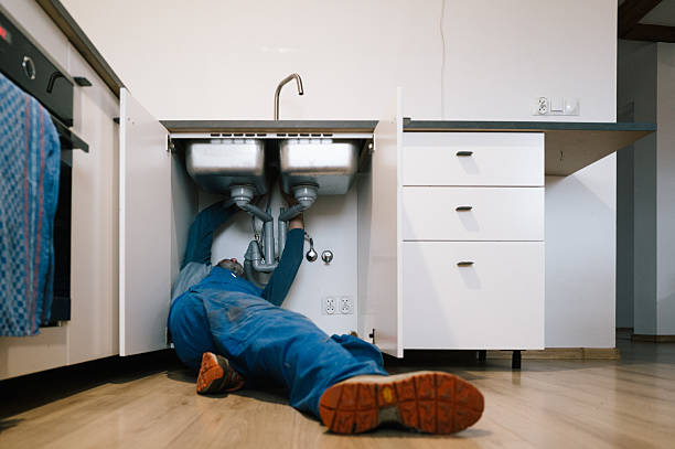 Professional Emergency Plumber technician working in Columbia, CT